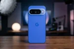 Google Pixel 11 Pro blue color smartphone with glowing LED camera module on a wooden desk, leaked specifications reviewed by Sudheer Sayana for Taja Points