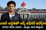 Indian youth pointing towards UPSC NDA 2 2026 recruitment notification text. The image features Telugu text translating to 'UPSC NDA Jobs - 12th Pass, 394 Posts'. Taja Points defence job updates.